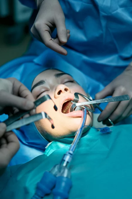 A lady having her oral surgery.