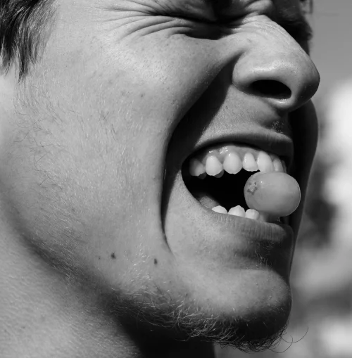 A man free from tooth sensitivity.