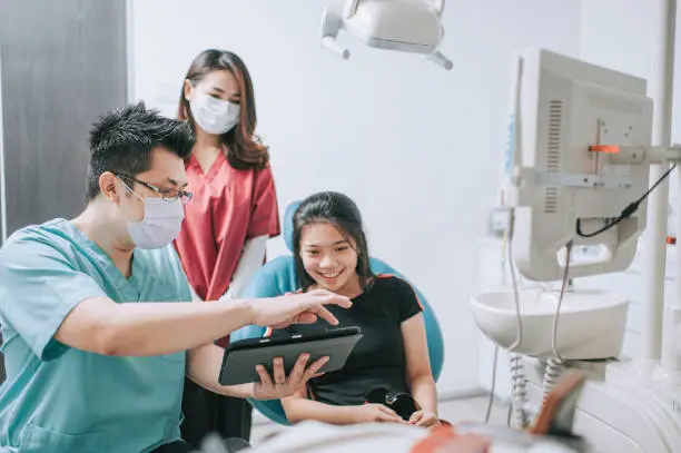 dentist with patient consultation