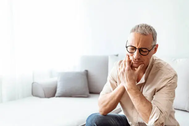 person with tooth pain