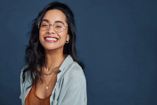 Dental implant patient showing confident smile in Falls Church