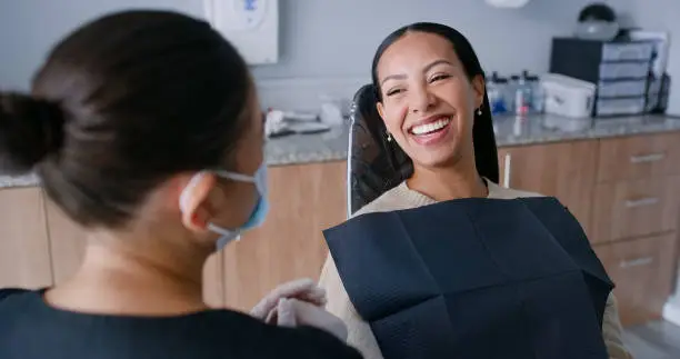 dentist with patient smiling