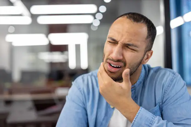 person with tooth pain