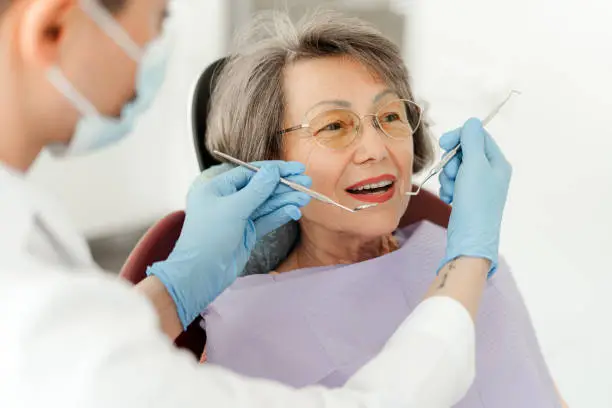 dentist with patient consultation