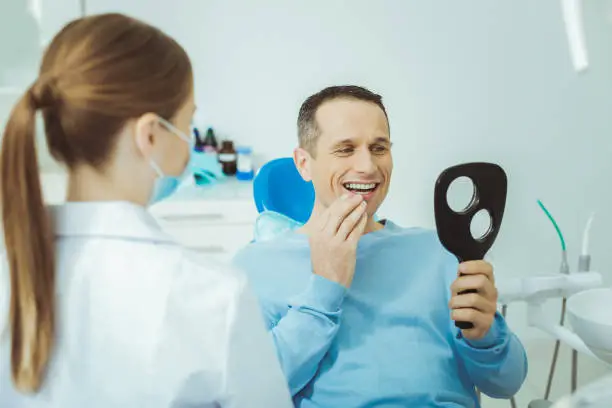 Patient enjoying dental implants results in Falls Church